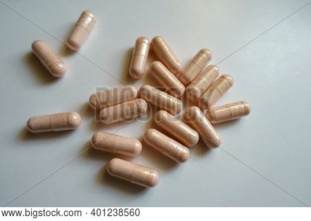 A Lot Of Pink Capsules Of Probiotic Dietary Supplement