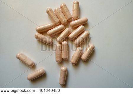 Numerous Pink Capsules Of Probiotic Dietary Supplement From Above