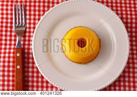 Quindim Is A Sweet That Has As Ingredients Egg Yolk, Sugar And Grated Coconut, Very Traditional In B
