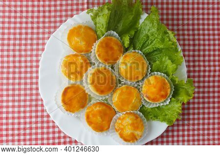 Empada Or Empadinha Is A Very Popular And Traditional Snack Of Brazilian Cuisine, On A White Plate O