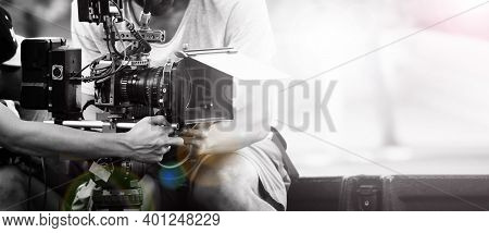 Film Industry. Filming With Professional Camera. Videographer Holding 4k Cam On Dslr Rig Or Gimbal S