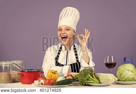 Just Perfect. Happy Smiling Chef Preparing Meal With Various Vegetables. Ready To Cook New Dish. Fre