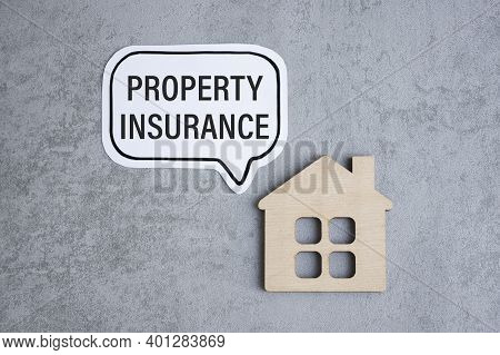 Business Concept. Notebook With Text Property Insurance Heet Of White Paper For Notes, Calculator, G