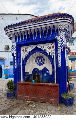 Public Fountain Of The Plaza El Hauta In Chefchaouen, Morocco