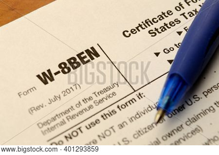 A Macro Shot Of A Blank W-8ben Form To Fill Out For Selling Copyrighted Material In The Usa And Redu
