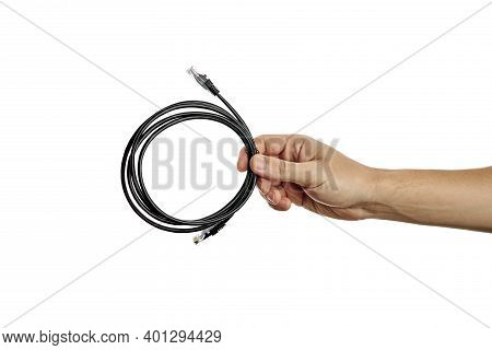 Internet Or Network Cable At Caucasian Person Hand. Person Give Cat5e Cable. Isolated On A White Bac