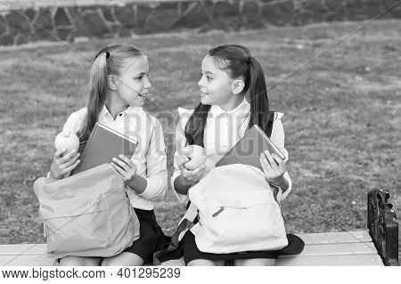 Beginning Their Knowledge Journey. Happy Girls Back To School On September 1. Little Children On Sep