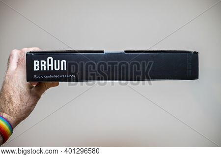 Paris, France - Dec 8, 2020: Pov Personal Perspective Male Hand Holding Package Of New Braun Bc17f-d
