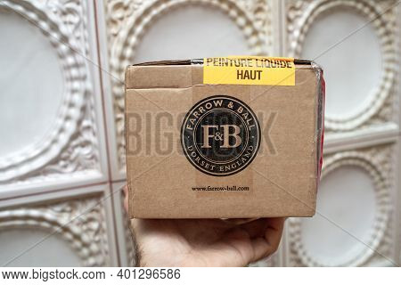 Paris, France - Dec 9, 2020: Pov Personal Perspective Male Hands Holding Package With Farrow And Bal