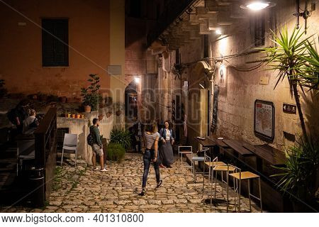 Matera, Italy - September 15, 2019: Evening View Of The City Of Matera, Italy, With The Colorful Lig