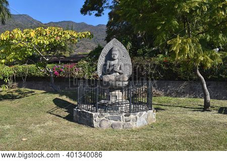 Ajijic, Mexico - November 28, 2020: A Replica Of The Buddha Statue On The Malecon In Ajijic