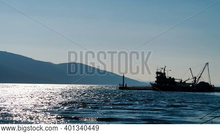 Marmaris, Akyaka, Turkey - November 2020: Silhouette Of A Fishing Ship With Unidentified People And 