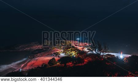 A Low-key Long Exposure Shot With A View Of Arpoador Beach At The Night From High Above: Coastline, 
