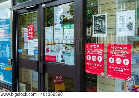 Bala; Uk: Sep 20, 2020: The Bala Branch Of Rowlands Chemists Has A Quantity Of Information Signs Dis