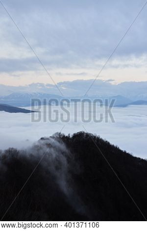 Low Clouds, View Of Winter Forest And Mountains From Observation Deck, Vertical Picture Of Amazing N
