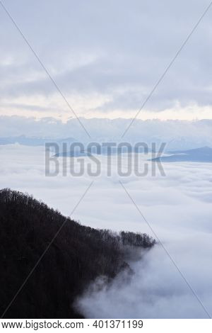 Low Clouds, View Of Winter Forest And Mountains From Observation Deck, Vertical Picture Of Amazing N
