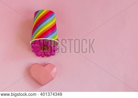 Valentines Day. Paper Cup Rainbow And Gerbera ,heart On Soft Pink Background. The Concept Of Gay Pri