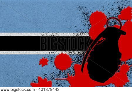 Botswana Flag And Mk2 Frag Grenade In Red Blood. Concept For Terror Attack Or Military Operations Wi