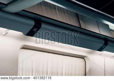 Shelf For Bags And Suitcases In The Modern European Train, Luggage Space. Modern Train Interior, Hol