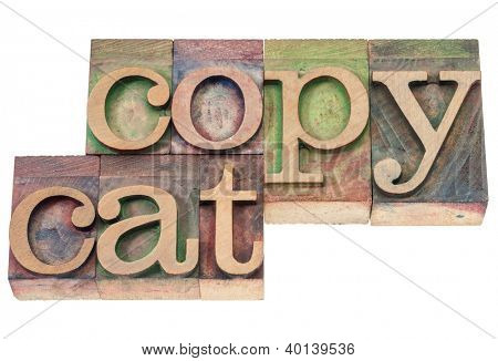copycat  - isolated text in vintage letterpress wood type blocks stained by color inks