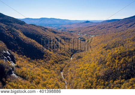 Panoramic View Of Late Fall Foliage In Smugglers Notch, Vermont.