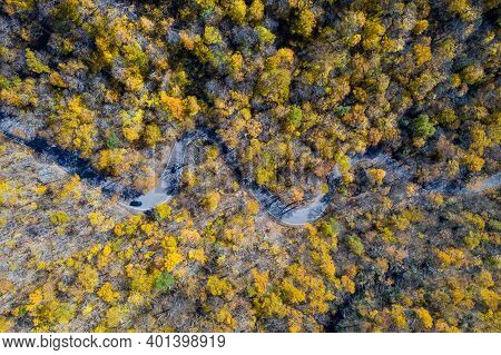 Panoramic View Of Late Fall Foliage In Smugglers Notch, Vermont.