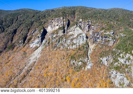 Panoramic View Of Late Fall Foliage In Smugglers Notch, Vermont.