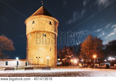 Tallinn, Estonia. Night Starry Sky Above Traditional Old Architecture Skyline In Old Town. Medieval 