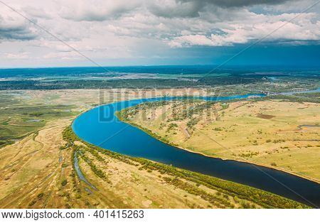 Rechytsa, Gomel Region, Belarus. Aerial View Of Dnieper River. Sky Above Green Meadow And River Land
