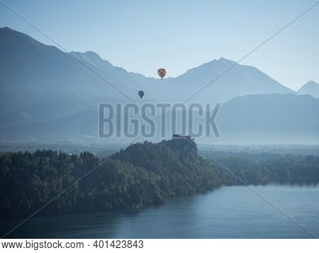 Panoramic View Of Hot Air Balloons Over Lake Bled Castle Blejsko Jezero Upper Carniolan Julian Alps 