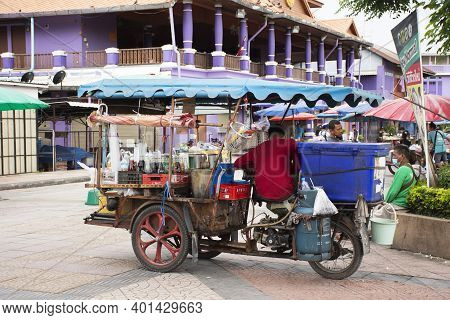 Thai Men People Sit On Tricycle Cart Sale Soft Drinks Water And Antique Coffee At Local Center Marke