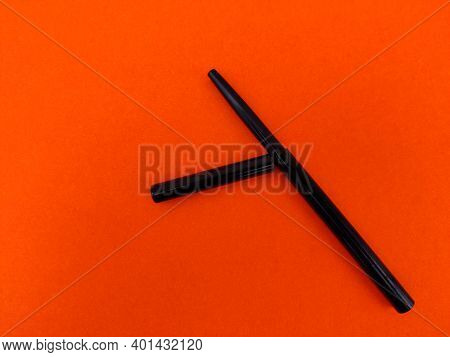 Kajal Pencil With Cap Isolated On Orange Background.