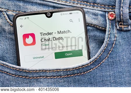 Wroclaw, Poland - Nov 30, 2020: Tinder Logo On Smartphone In Pocket. Tinder Is Most Popular Dating A