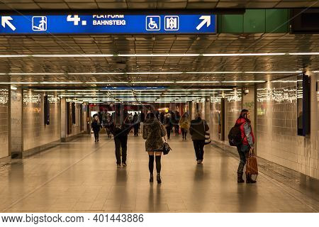 Prague, Czech Republic, 12-31-2020. People Walking To Catch Their Train To Departure From Prague Mai