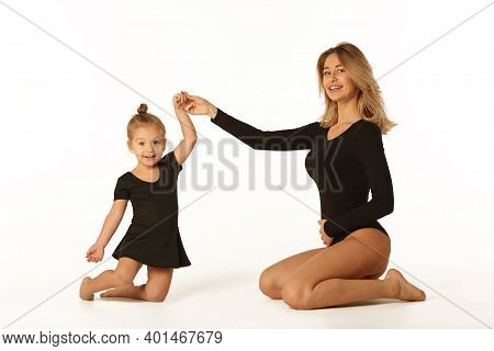 Cute Baby Girl And Mum In Black Body Having Fun Full Body Studio Portrait
