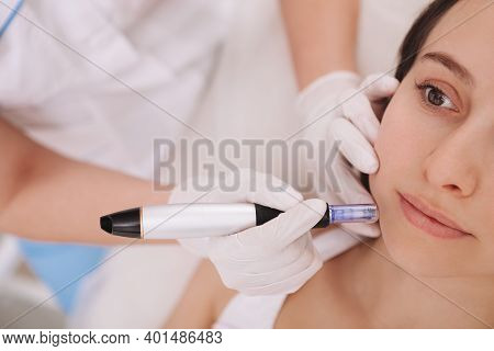 Cropped Close Up Of A Young Woman Getting Facial Mesotherapy Treatment By Professional Dermatologist