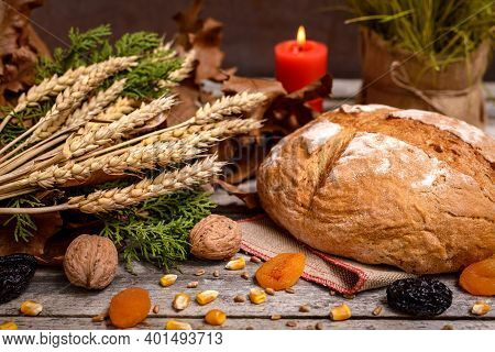 Traditional Food For Orthodox Christmas Eve. Yule Log Or Badnjak, Bread, Cereals, Dried Fruits And B