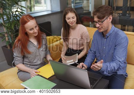 Top View Shot Of A Group Of Business People Working Together At Modern Office