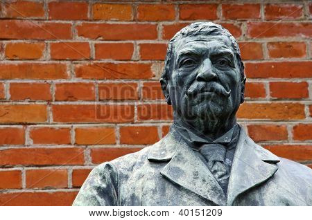 Brons skulptur av en Man med mustasch