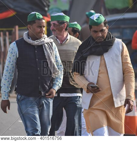 New Delhi, India – December 25 2020 : Indian Sikh & Hindu Farmers From Punjab, Uttar Pradesh And Utt