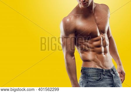 Athletic Young Man Shirtless, Showing Six Pack Abs, Relief Press, Isolated On Yellow Screen Chrome K