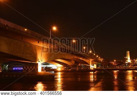 Landscape Of Phra Phuttha Yodfa Memorial Ancient Bridge Cross River In Thailand Cn Night