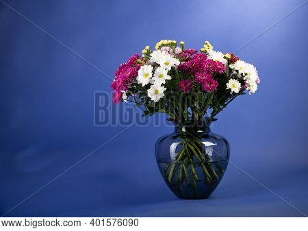 Clorfull Mix Flowers Bouquet Studio Shot On Blue Background