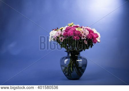 Clorfull Flowers Bouquet Studio Shot On Blue Background