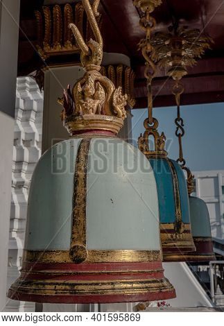 Ancient Bells Hanging On Pillars Outside In The Thai Temple. Thai Temple Bell Which Believe That Who
