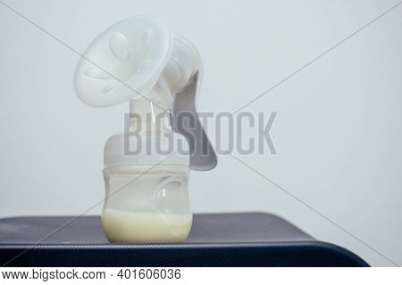 Manual Breast Pump, Mothers Breast Milk Giving Healthy Food For Newborn Baby
