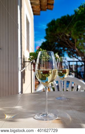 Tasting Of Local White Wine On Sunny Summer Balcony Provence, France