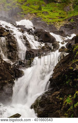 Norwegian Landscape. Waterfall Latefoss Latefossen, Odda Hordaland County In Norway. National Touris