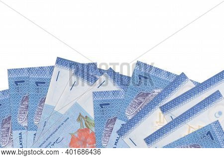 1 Malaysian Ringgit Bills Lies On Bottom Side Of Screen Isolated On White Background With Copy Space