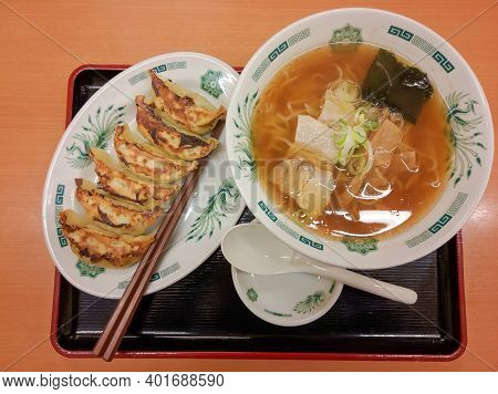 Tokyo, Japan - April 3, 2018: Plate With Ramen Noodles And Gedza Dumplings. Japanese Style Lunch, Pl
